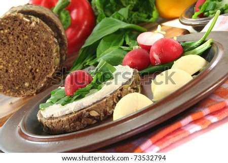Wild garlic Bread with Cream cheese, wild garlic and radishes