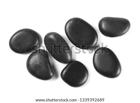 Similar – Image, Stock Photo Various pebbles on black sandy shore in sunlight