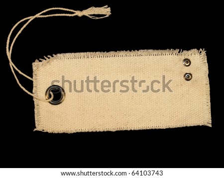 Blank textile tag isolated on black background