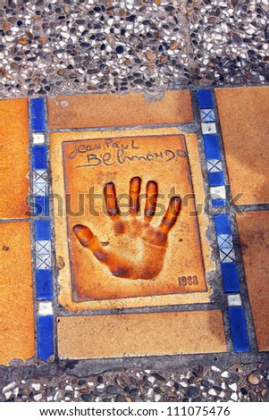 CANNES, FRANCE - JUNE 13: Print of a palm of a hand of the known actor of cinema Jean Paul Belmondo, located on the famous \