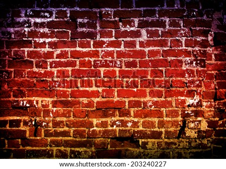 Old wall of red brick close-up, natural texture