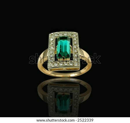 Emerald ring by a present