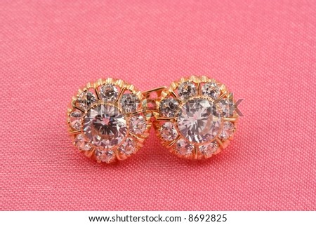 Jewelry diamond presents on pink