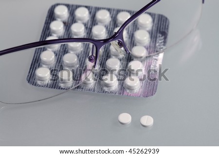Medical tablets and eye glasses