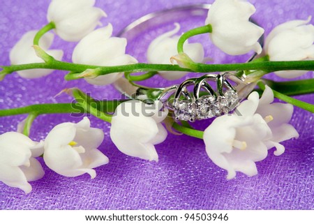 Elegant jewelry ring with brilliant and spring natural flowers