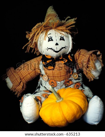Scarecrow and mini pumpkin. Great for Halloween, Autumn, and Thanksgiving.