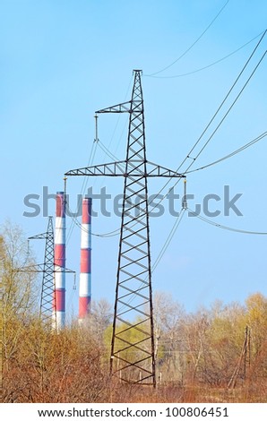 Electric lines pylon from power plant and blue sky