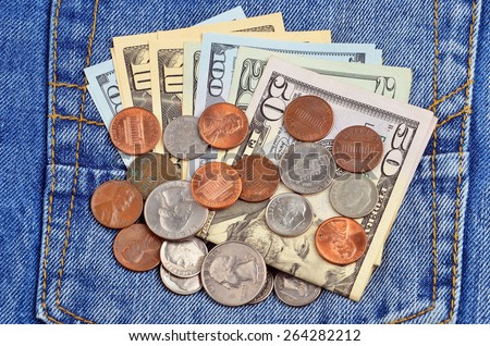 Money, coin and dollars in jeans pocket