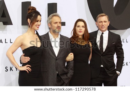 BERLIN, GERMANY - OCTOBER 30: Berenice Marlohe, Sam Mendes, Barbara Broccoli and Daniel Craig attend the Germany premiere of James Bond 007 movie \