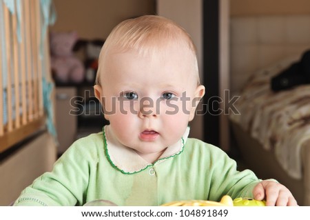 a small child looking surprised