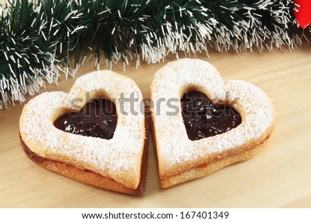 Heart shaped cookies with jam. Christmas decorations