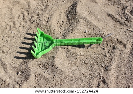 rake for children's play in the sand