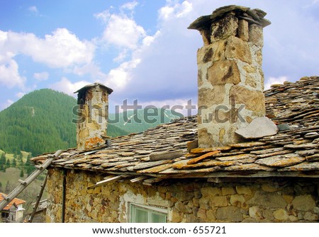 Stone Tiles Roof and Chimneys of an Old Mountain House, Rhodopes Mountain, Bulgaria