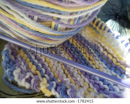 Yarn, needle and dish cloth