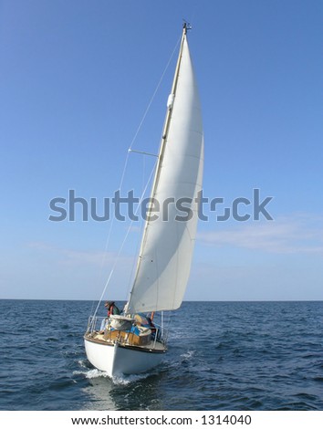 Yacht on full sails