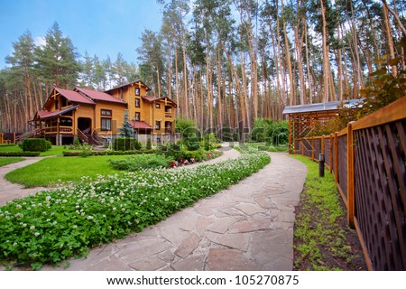 Similar – Image, Stock Photo Pine trees and residential buildings