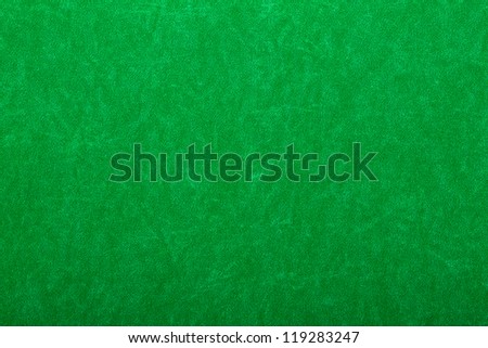 Abstract background of green felt on casino table