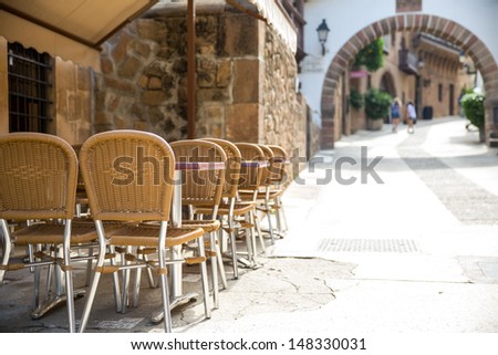 Restaurant tables in old european town