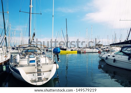 Small sailboats in a Barcelona harbor