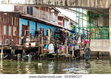 Shanty-town. on canal in Thailand