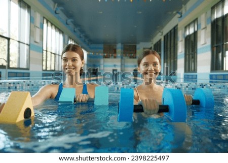 Similar – Image, Stock Photo Inspired woman swimming in stony pool in mountain waterfall