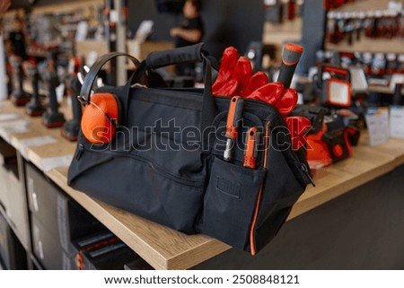 Similar – Image, Stock Photo Repairman with headphones in workshop