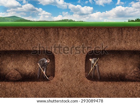 Business people dig a tunnel underground