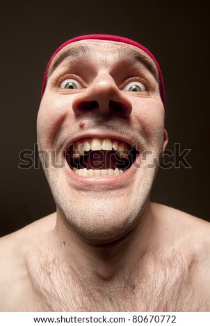 Close-Up Portrait Of Insane Funny Surprised Man Stock Photo 80670772 ...