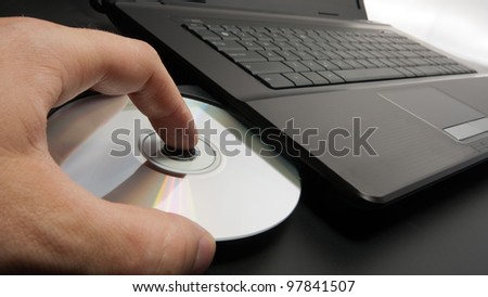 Loading CD - DVD into laptop