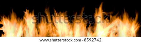 Wall of fire and flames over black background