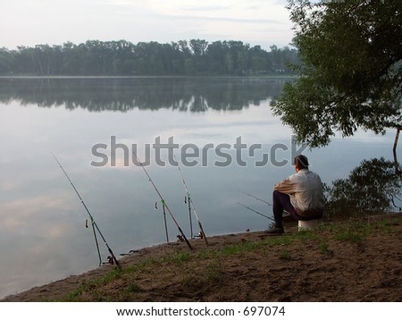 The fisherman with fishing tackles