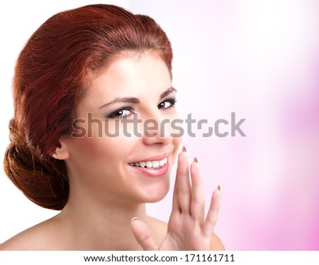 Beauty Portrait Girl on a abstract pink background.Perfect Fresh Skin. Youth and Skin Care