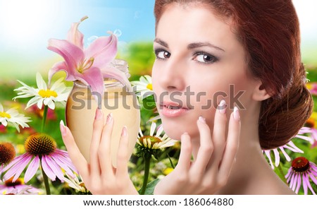 Beauty Girl Portrait. Beautiful Spa Woman.Natural Cream for Skincare Face