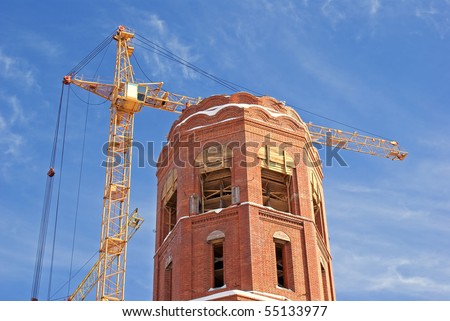 high-altitude tower crane necessary for elevation cargo and architectural construction  by erection new-built building