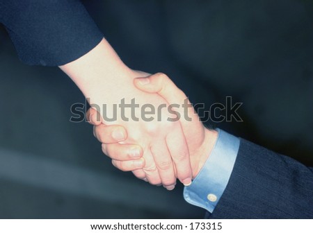 business people holding hands