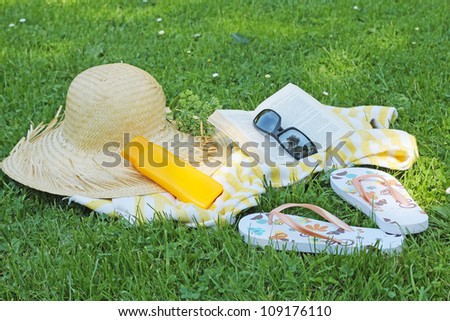 summer accessories on grass in garden