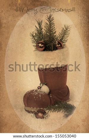 Christmas retro boots on sepia background