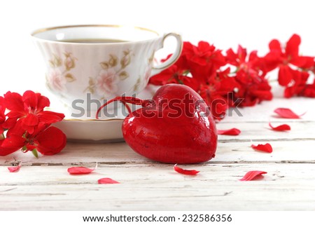 red heart love with bird lovers and flowers on wooden table