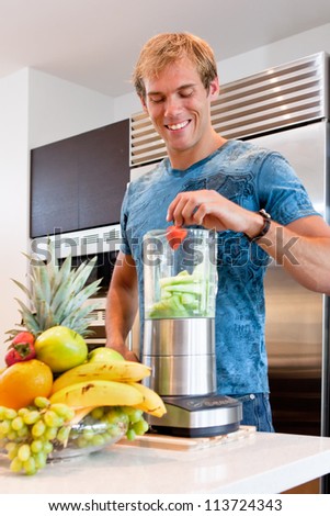 Young Man Making a Smoothie