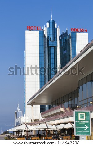 ODESSA, UKRAINE - SEPTEMBER 6: Building of 4-star Odessa Hotel built in 2001 behind the Sea Port Passenger Terminal on September 6, 2012 in Odessa, Ukraine. It has 19 floors, all rooms have a sea view