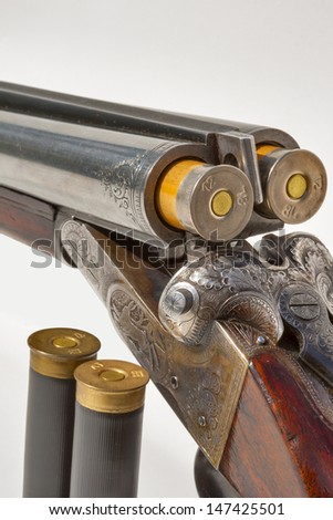 hunting vintage rifle charged with additional cartridges macro