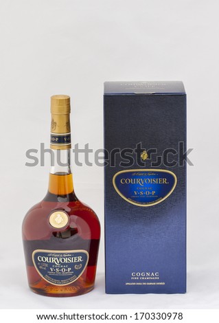 KIEV, UKRAINE - MAY 06, 2012: Courvoisier V.S.O.P. (very superior old pale) Cognac bottle and box against white. It is a luxury brand of French cognac established by Felix Courvoisier in 1835.