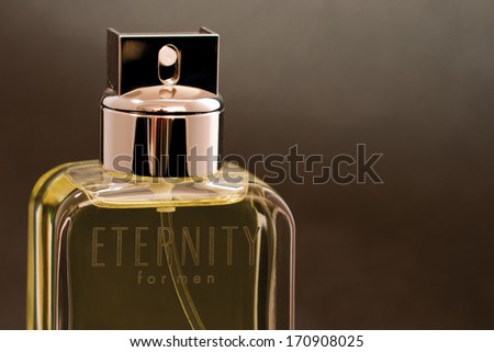 KIEV, UKRAINE - FEBRUARY 15, 2011: Calvin Klein Eternity fragrance for men bottle against black background. Eternity for men fragrance was created by Carlos Benaim and was launched in 1989.