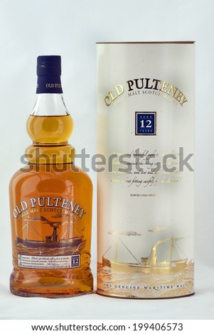 KIEV, UKRAINE - AUGUST 27, 2011: Old Pulteney Single Malt Scotch Whisky bottle and box against white. The Pulteney Distillery is an aging malt whisky production facility in Pulteneytown, Scotland.