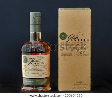 KIEV, UKRAINE - JUNE 18, 2011: Bottle and box of 12 years old single malt scotch whisky Glen Garioch against black. It is one of the oldest whisky distilleries in Scotland owned by the company Suntory