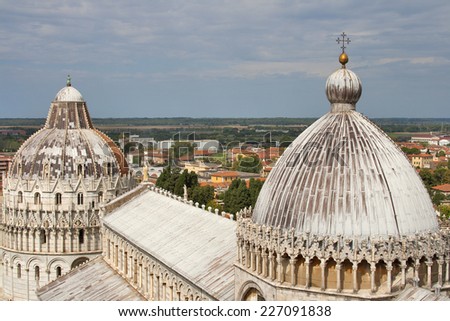 The Pisa Baptistryand cathedral Duomo cupola on Square of Miracles, Tuscany, Italy. A UNESCO World Heritage Site.