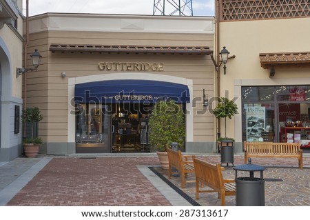MUGELLO, ITALY - SEPTEMBER 11, 2014: Facade of Gutteridge store in McArthurGlen Designer Outlet Barberino in 30 minutes from Florence. Gutteridge is an Italian clothing company founded 1878 in Naples.