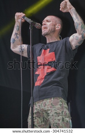 KIEV, UKRAINE - MAY 23, 2015: Sergey Mikhalok leader of punk rock band Brutto performs song during show in International Tattoo Convention Kyiv Tattoo Collection 2015 in Art-factory Platforma.