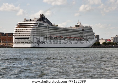 COPENHAGEN, DENMARK - MAY 29: MSC Orchestra cruise ship built in 2007 moored in harbor on May 29, 2010 in Copenhagen, Denmark. She can accommodate 2,550 passengers in 1,275 cabins.