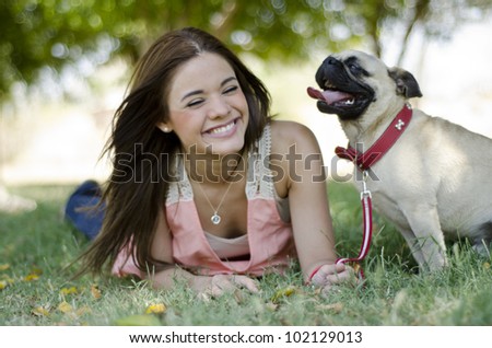 Similar – Image, Stock Photo Owner petting pug dog on grass